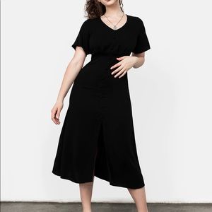 Super cute Disturbia brand black midi dress with button details!